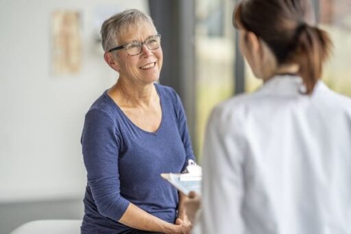 Pharmacogenetic testing for depression represented by a medical provider explaining something to a patient.