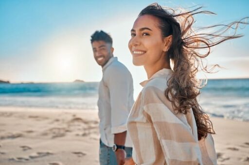 Shot of a young couple spending time together at the beach, demonstrating how ketamine can improve quality of life for people with Depression